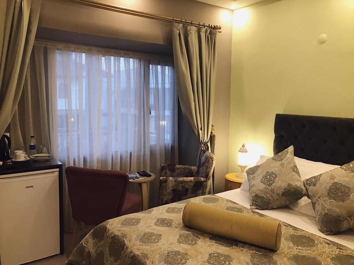 Itimat Otel Urla Esterno foto